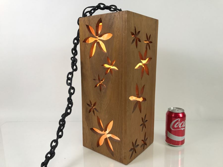 Hanging Wooden Light Fixture With Floral Cut Outs [Photo 1]