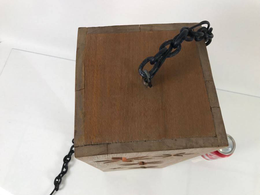 Hanging Wooden Light Fixture With Floral Cut Outs [Photo 7]