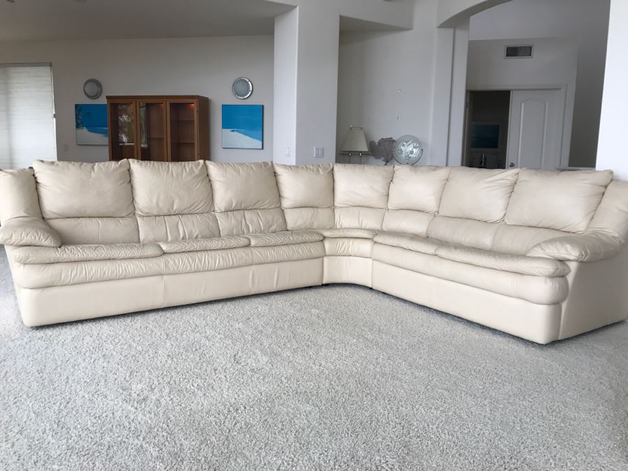 Large White Leather Sectional Sofa - See Photos For Wear Of Seat On Left End [Photo 1]