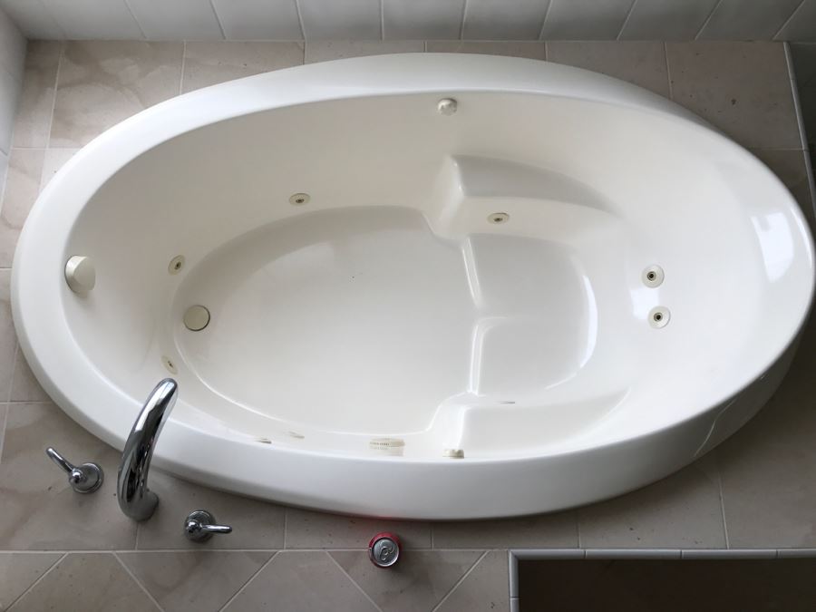 Drop-In Whirlpool Tub From Scandinavian Marble With Pump And (2) Matching Bathroom Sinks With GROHE Stainless Steel Fixtures [Photo 1]
