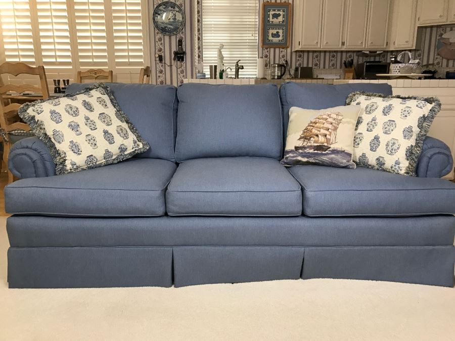 Clean Highland House Blue Sofa With Accent Pillows [Photo 1]