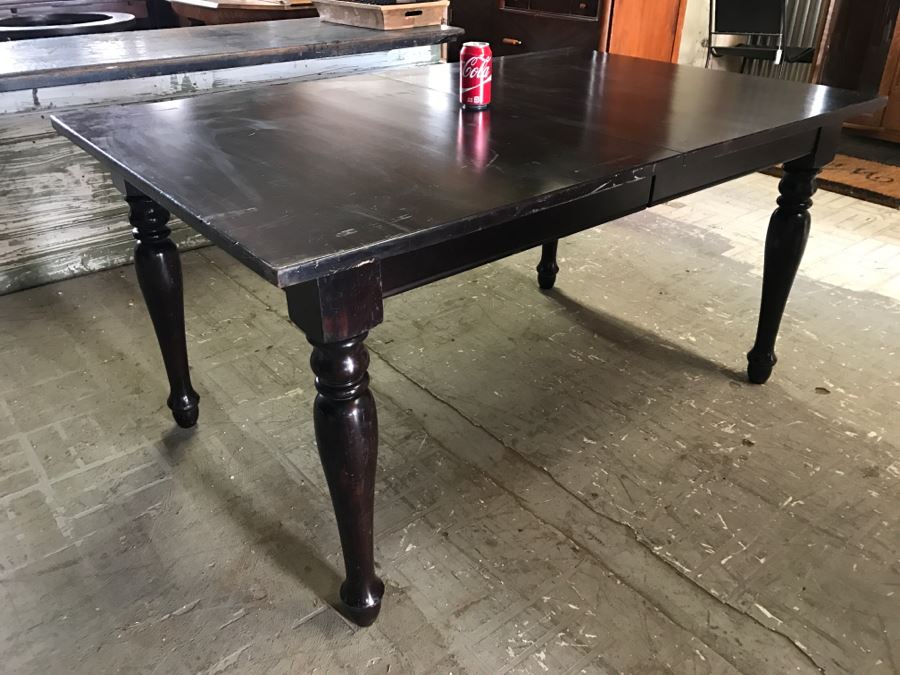 Crate & Barrel Dark Wood Dining Table With Turned Legs [Photo 1]