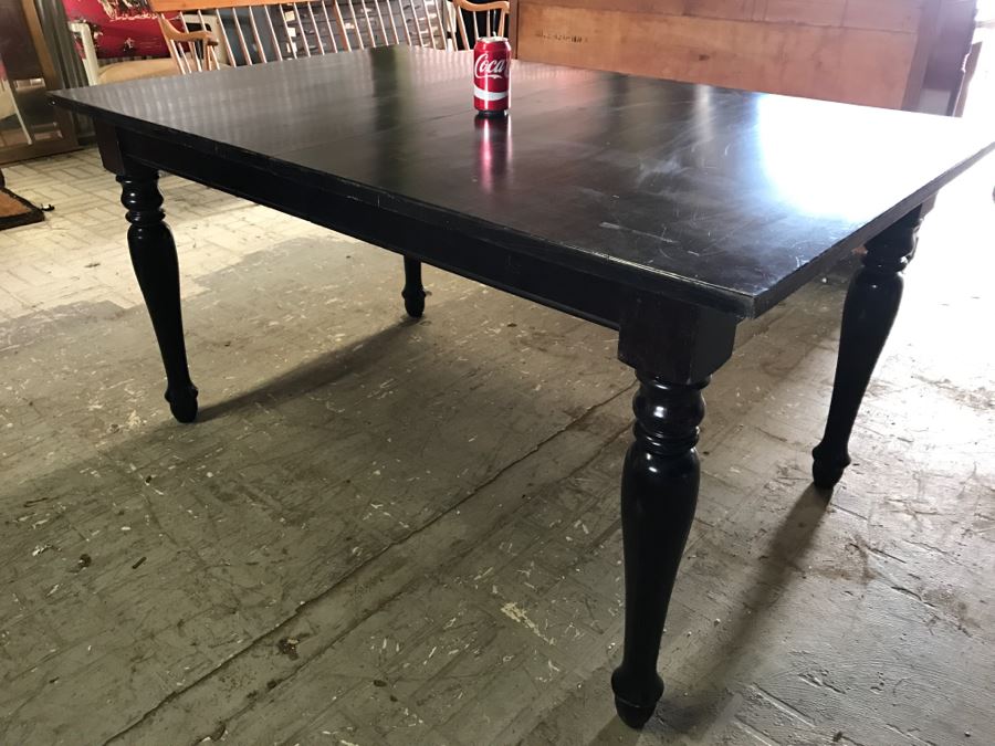Crate & Barrel Dark Wood Dining Table With Turned Legs [Photo 7]