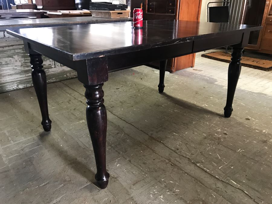 Crate & Barrel Dark Wood Dining Table With Turned Legs [Photo 3]