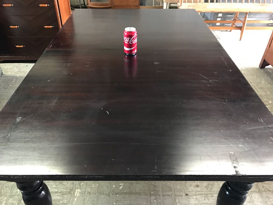 Crate & Barrel Dark Wood Dining Table With Turned Legs [Photo 6]