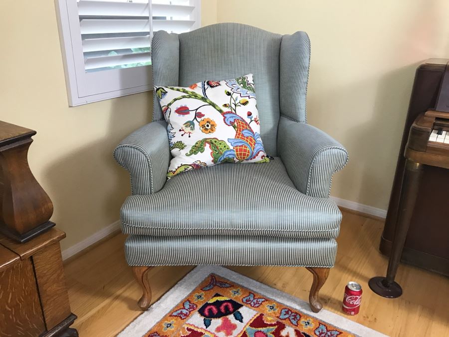 Nice Wingback Upholstered Chair With Throw Pillow [Photo 1]