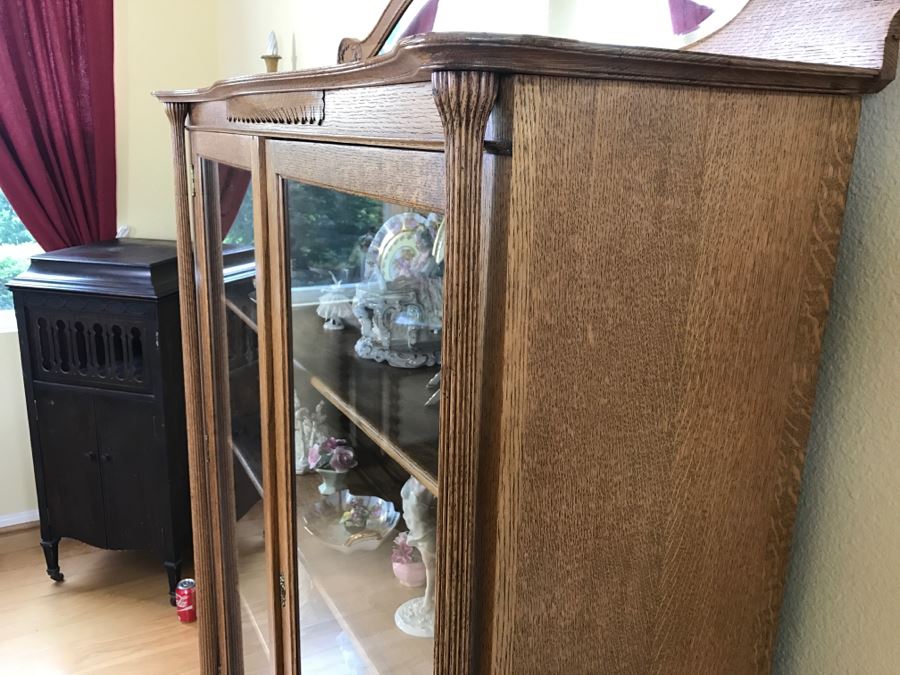 Stunning Tiger Oak Glass Front Curio Cabinet With Beveled Glass Mirror And Nice Wood Carvings [Photo 8]