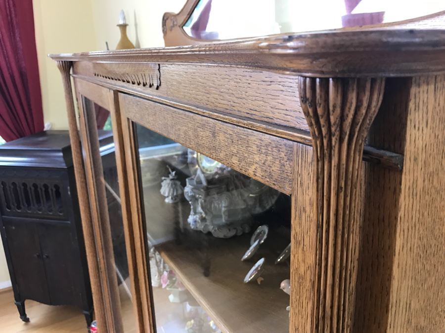 Stunning Tiger Oak Glass Front Curio Cabinet With Beveled Glass Mirror And Nice Wood Carvings [Photo 10]