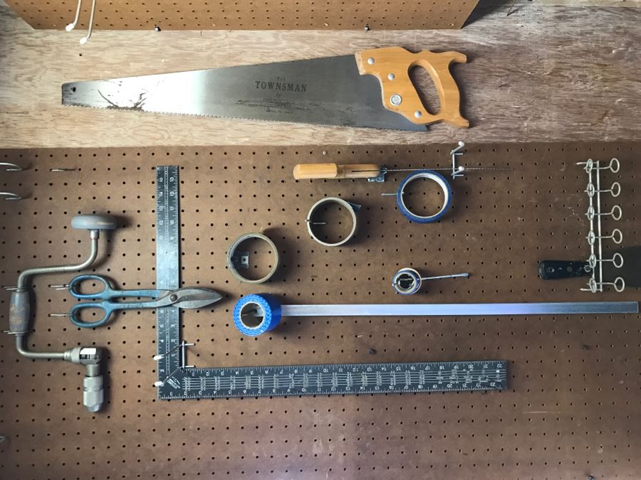 Various Tools Including Disston Saw Shown On Wall [Photo 1]