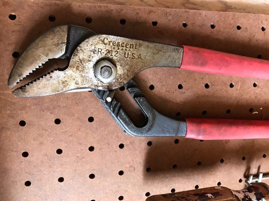 Various Tools Shown On Counter And Wall Including Wiss Shears, Hammers, Screwdrivers, Bolt Cutters, Wrenches And More [Photo 19]