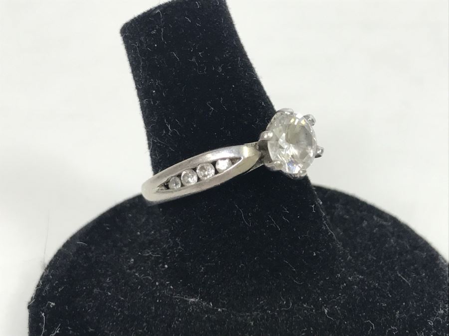 JUST ADDED - Sterling Silver 6 Prong Clear Center Stone Flanked On Each Side With 4 Graduated Clear Channel Set Stones 3.6g [Photo 2]