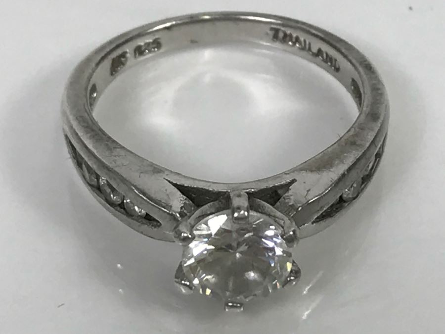 JUST ADDED - Sterling Silver 6 Prong Clear Center Stone Flanked On Each Side With 4 Graduated Clear Channel Set Stones 3.6g [Photo 11]