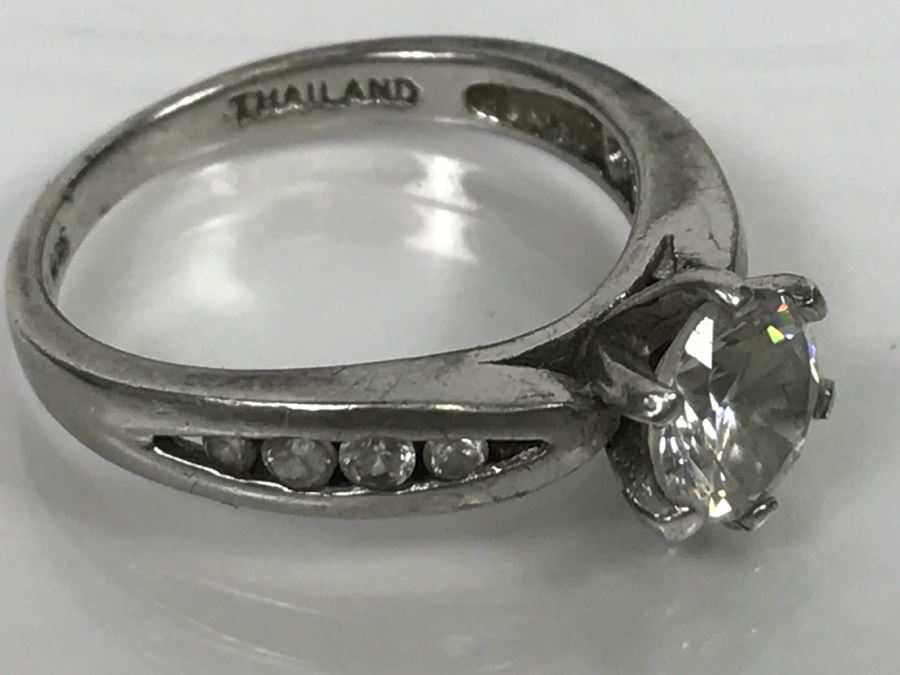 JUST ADDED - Sterling Silver 6 Prong Clear Center Stone Flanked On Each Side With 4 Graduated Clear Channel Set Stones 3.6g [Photo 9]