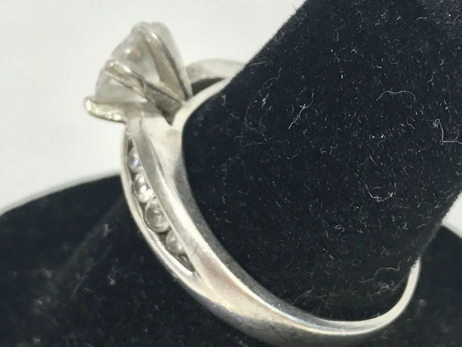 JUST ADDED - Sterling Silver 6 Prong Clear Center Stone Flanked On Each Side With 4 Graduated Clear Channel Set Stones 3.6g [Photo 6]