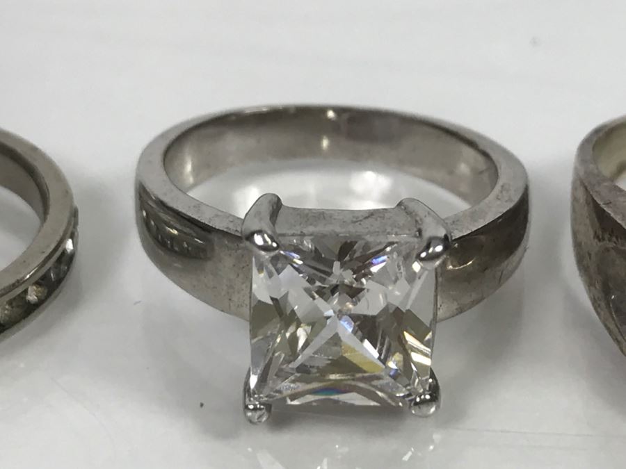 JUST ADDED - Set Of 4 Silver Tone Rings With Clear Stones [Photo 4]