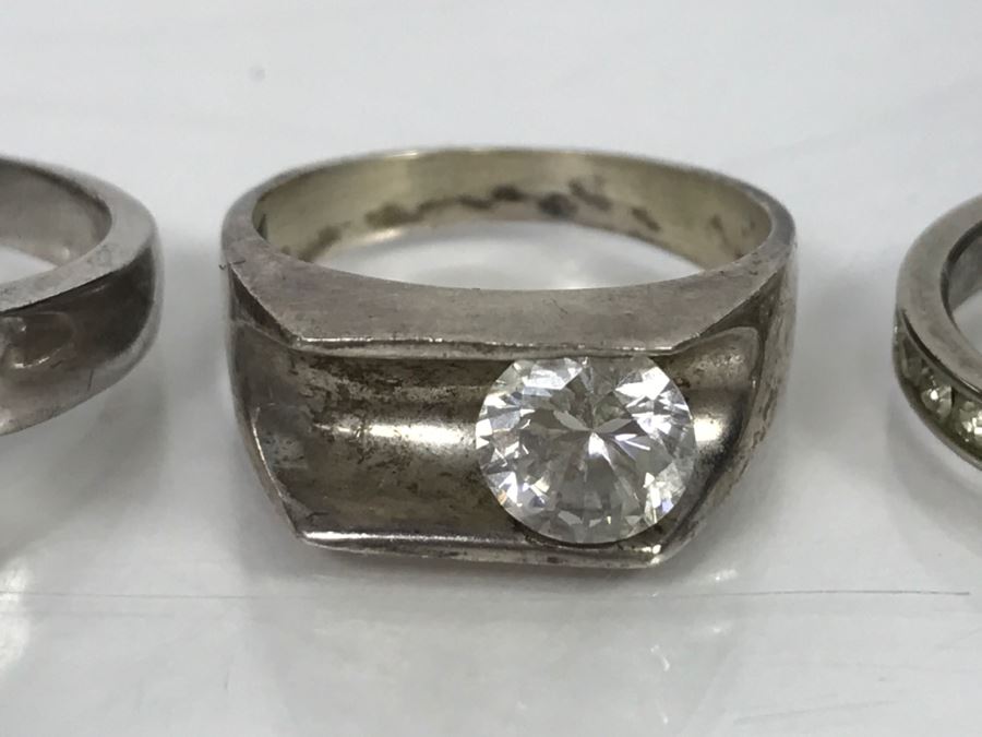 JUST ADDED - Set Of 4 Silver Tone Rings With Clear Stones [Photo 2]