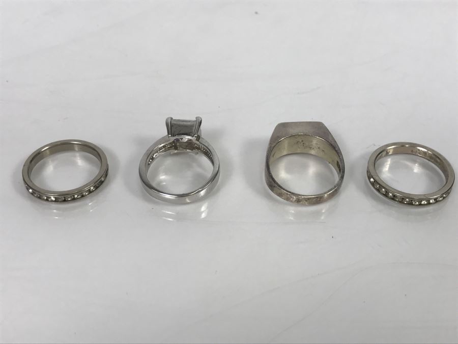 JUST ADDED - Set Of 4 Silver Tone Rings With Clear Stones [Photo 11]