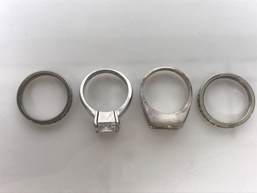 JUST ADDED - Set Of 4 Silver Tone Rings With Clear Stones [Photo 10]