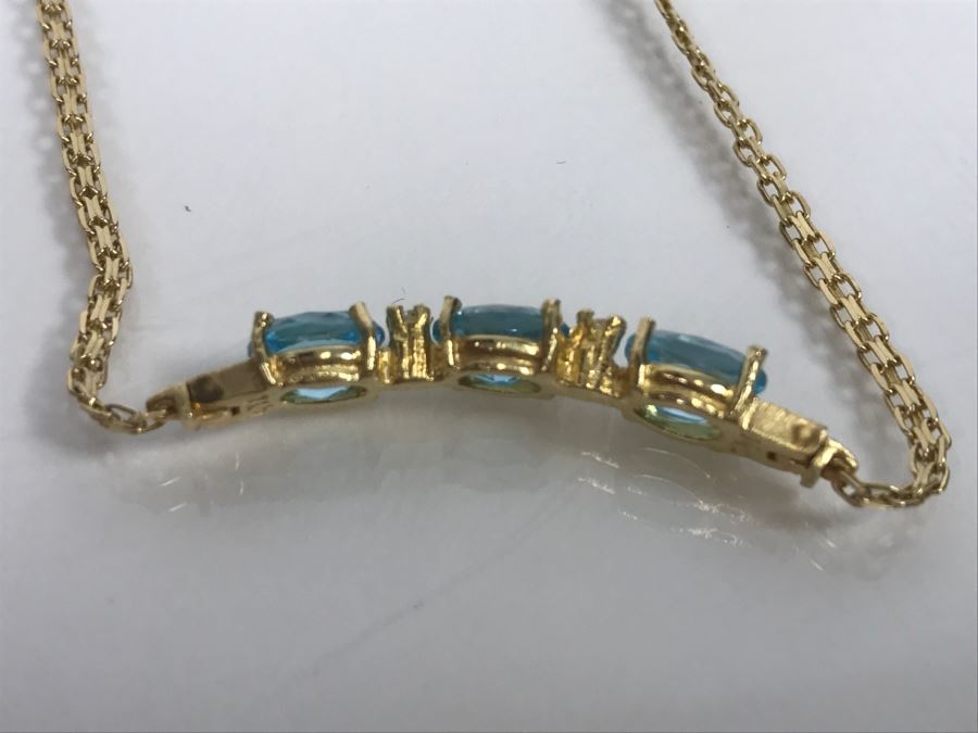 JUST ADDED - 14k Gold Bracelet With (3) Synthetic Blue Topaz Stones Accented With (2) Clear Stones 7 1/2' Long 4.2g [Photo 4]