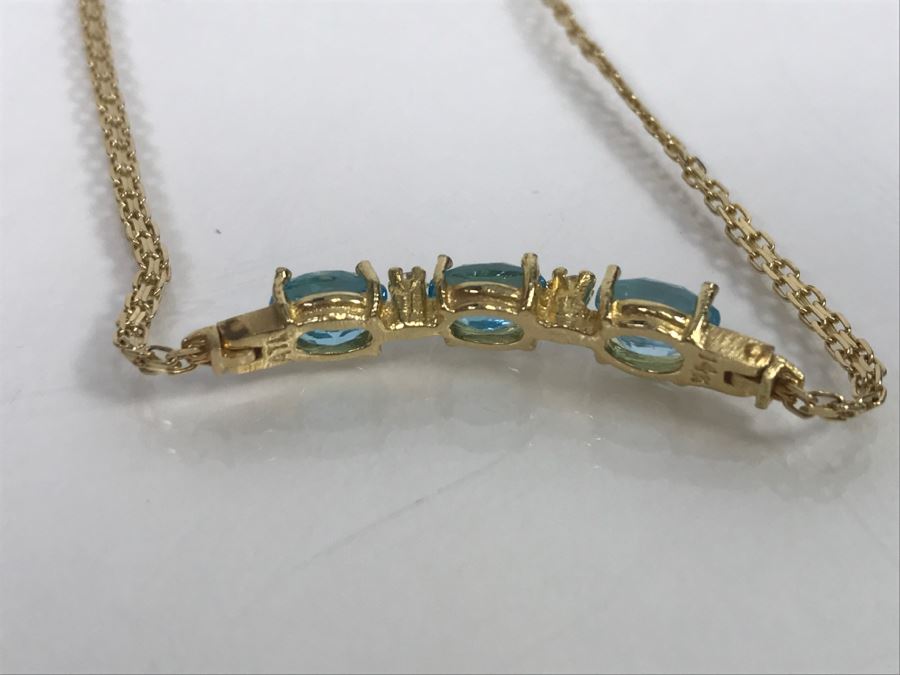 JUST ADDED - 14k Gold Bracelet With (3) Synthetic Blue Topaz Stones Accented With (2) Clear Stones 7 1/2' Long 4.2g [Photo 5]