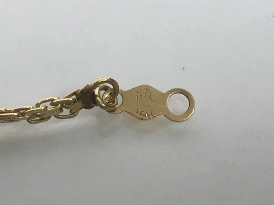 JUST ADDED - 14k Gold Bracelet With (3) Synthetic Blue Topaz Stones Accented With (2) Clear Stones 7 1/2' Long 4.2g [Photo 9]