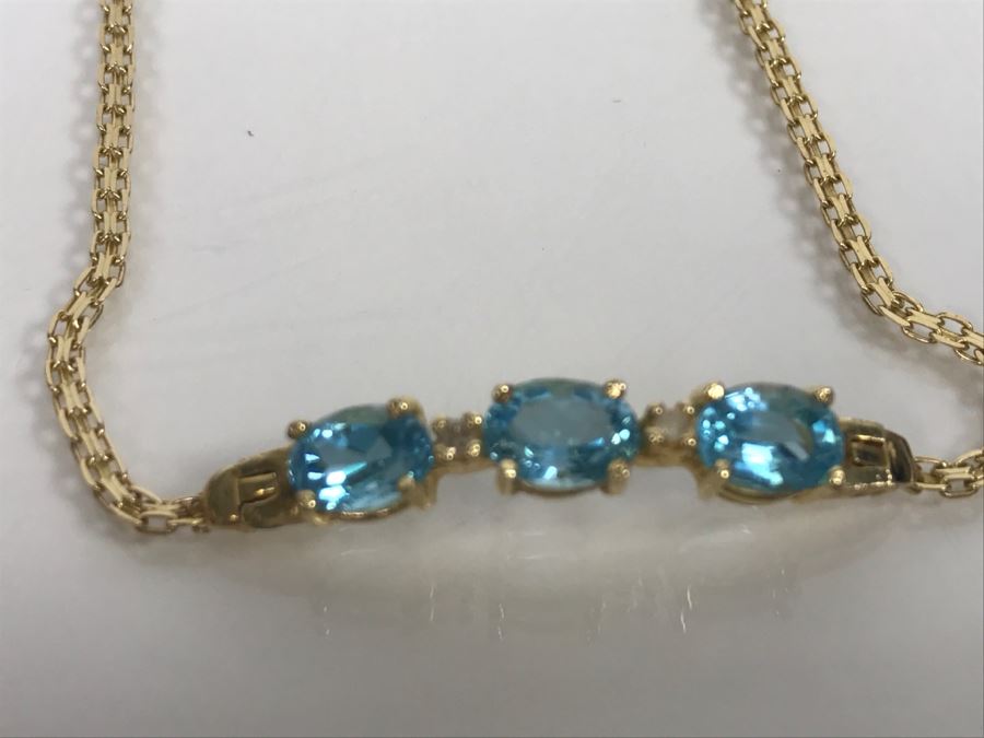 JUST ADDED - 14k Gold Bracelet With (3) Synthetic Blue Topaz Stones