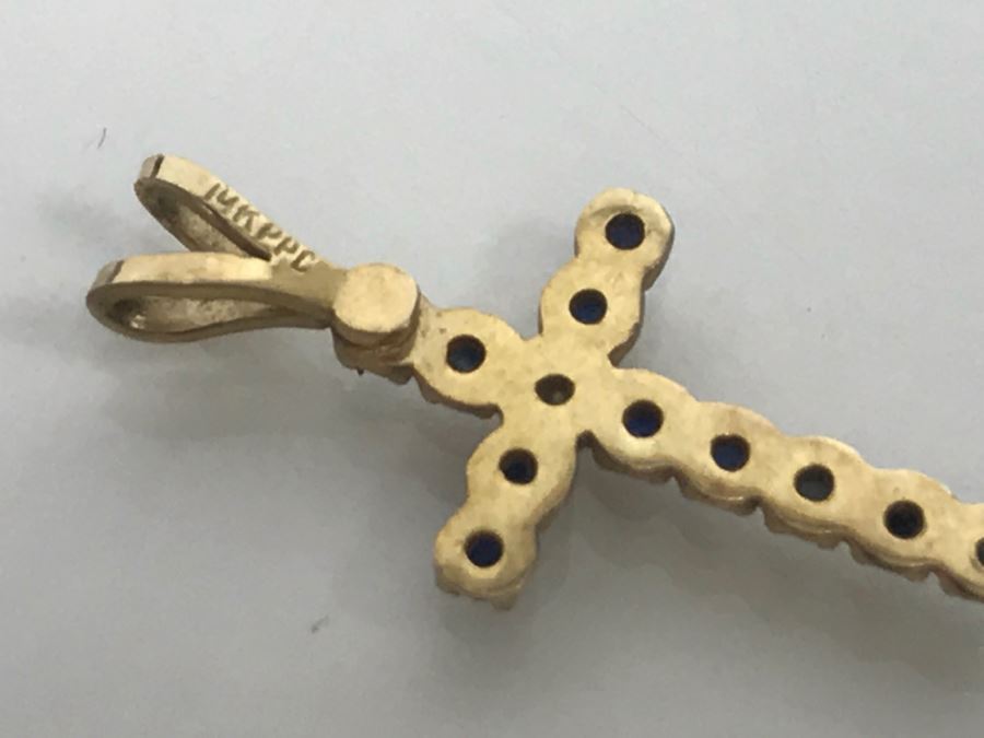 JUST ADDED - 14k Yellow Gold Cross With (11) Prong Set Saphire Like Stones And Clear Stone In Center Split Bale 3/4'L 0.5g [Photo 10]