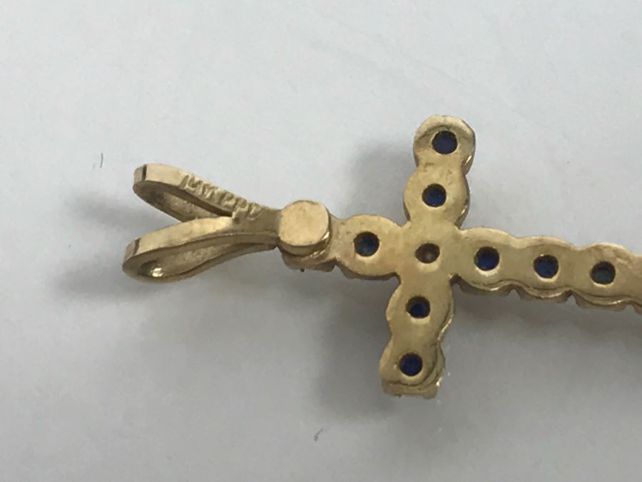 JUST ADDED - 14k Yellow Gold Cross With (11) Prong Set Saphire Like Stones And Clear Stone In Center Split Bale 3/4'L 0.5g [Photo 9]