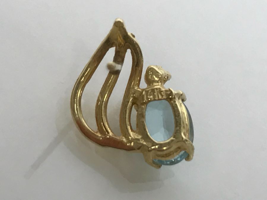 JUST ADDED - 14k Gold Oval Stud Earrings 4 Prong Set With Light Blue Stones Accented With Small 4 Prong Clear Stone With Yellow Gold Fluting 2.3g [Photo 5]