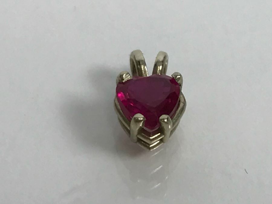 JUST ADDED - 14k Gold Heart-Shapped 4 Prong Set Light Red Stone With Split Bale 0.6g [Photo 1]
