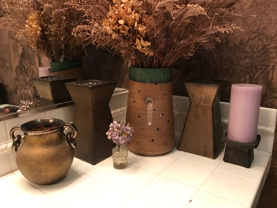 Home Decor Lot Featuring Vases, Faux Flower Arrangement, Candle Holder And Handled Vessel  [Photo 1]