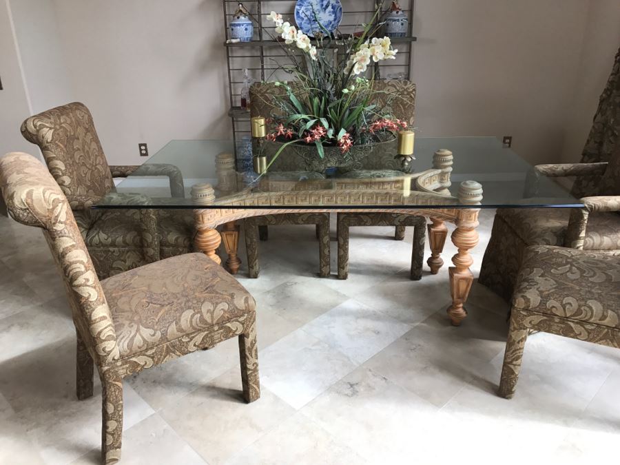 Stunning Designer Dining Table With Detailed Wooden Base And Glass Top With 6 Upholstered Dining Chairs