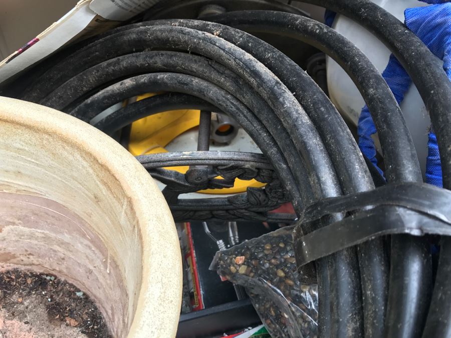 Suncast Plastic Outdoor Storage Container With Various Gardening Supplies Including Pots [Photo 13]