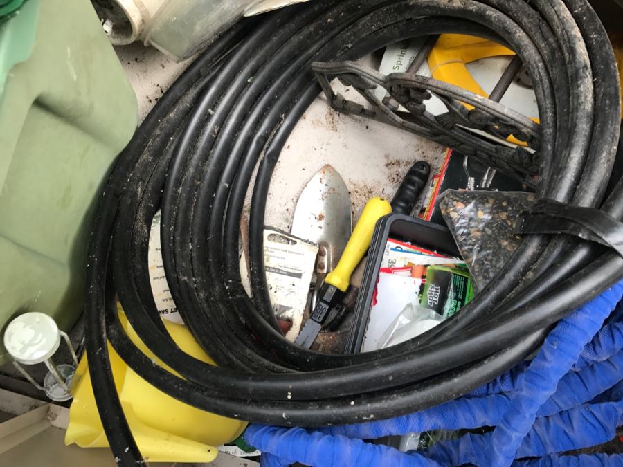 Suncast Plastic Outdoor Storage Container With Various Gardening Supplies Including Pots [Photo 14]