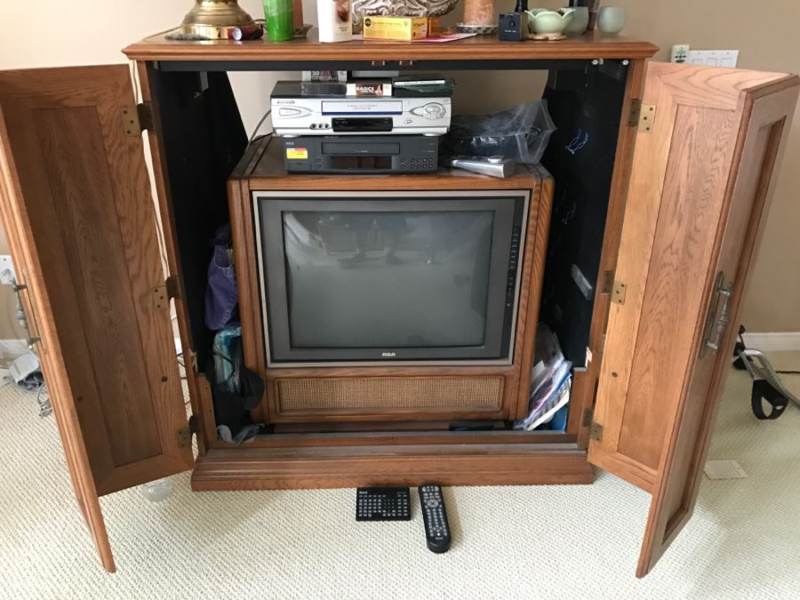 Oak Cabinet With Vintage RCA Tube TV, Pair Of VCRs, Workout VHS Tapes And All Other Goodies Found Within Cabinet