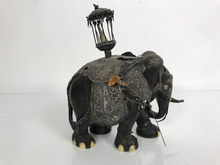 Hand Carved Ebony Elephant With Repousse Silver Garment Missing One Tusk [Photo 1]