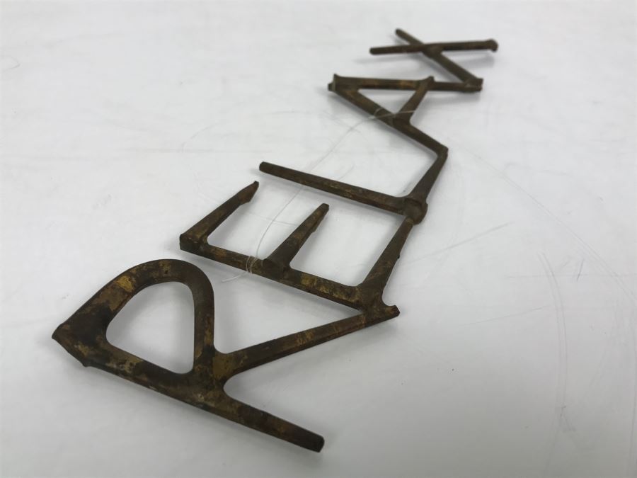Welded Metal Sculpture That Spells 'RELAX' [Photo 5]