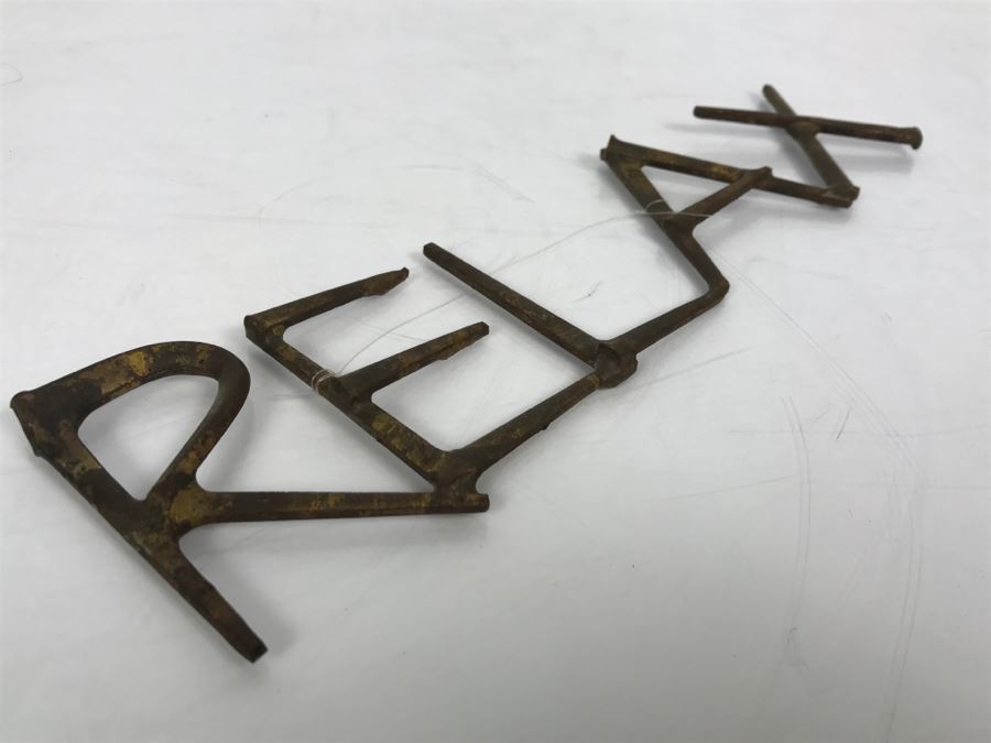 Welded Metal Sculpture That Spells 'RELAX' [Photo 6]