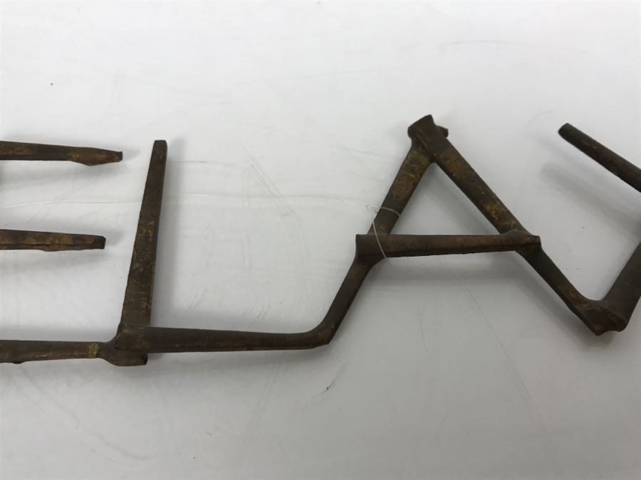 Welded Metal Sculpture That Spells 'RELAX' [Photo 3]