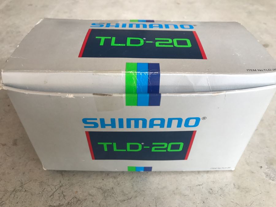 New In Box SHIMANO TLD-20 Graphite Fishing Reel [Photo 1]
