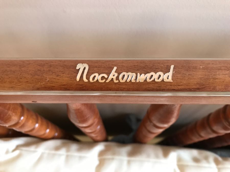 Vintage Wooden Nockonwood Baby Drop Side Crib With Various Baby Crib Bumbers, Bedding, And Other Items Photographed In Crib [Photo 10]