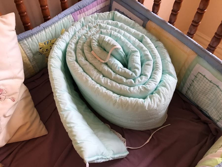 Vintage Wooden Nockonwood Baby Drop Side Crib With Various Baby Crib Bumbers, Bedding, And Other Items Photographed In Crib [Photo 7]