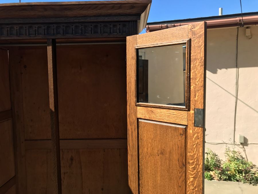 JUST ADDED - Antique Mission Style Oak Armoire With Clean Wooden Carvings And (6) Beveled Glass Side Mirrors And Bar For Hanging Clothes- See Photos [Photo 25]