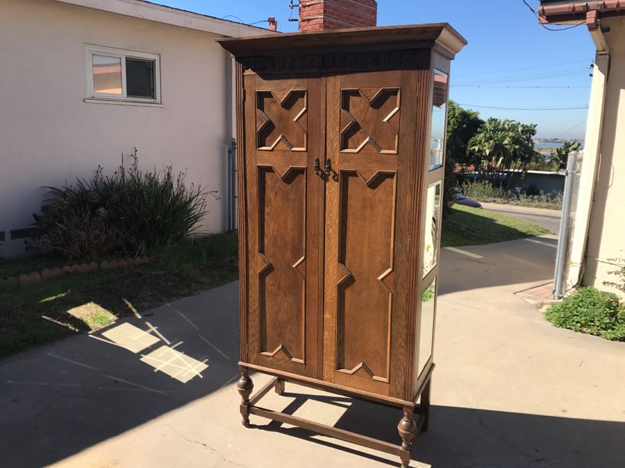 JUST ADDED - Antique Mission Style Oak Armoire With Clean Wooden Carvings And (6) Beveled Glass Side Mirrors And Bar For Hanging Clothes- See Photos [Photo 16]
