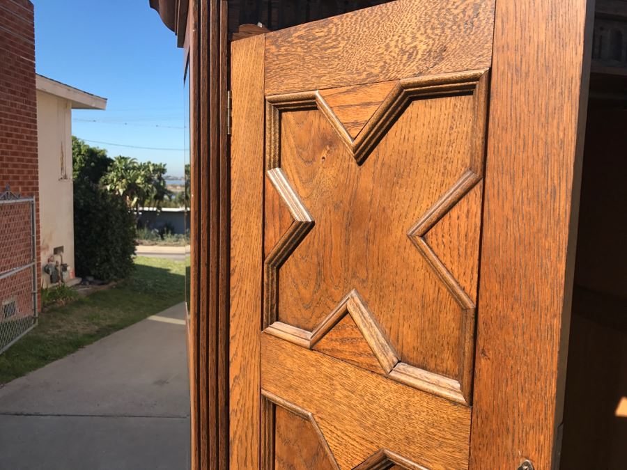 JUST ADDED - Antique Mission Style Oak Armoire With Clean Wooden Carvings And (6) Beveled Glass Side Mirrors And Bar For Hanging Clothes- See Photos [Photo 30]