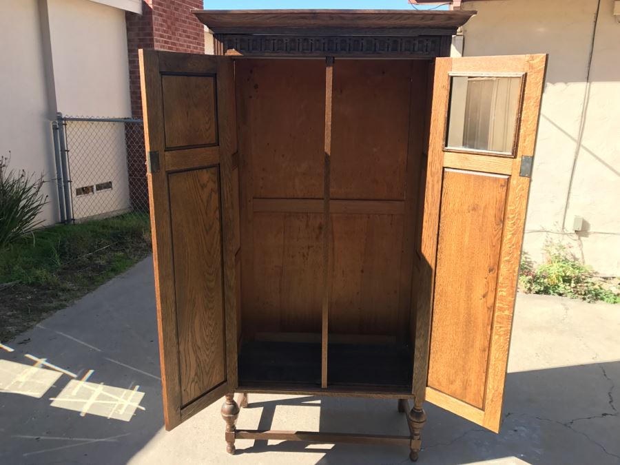 JUST ADDED - Antique Mission Style Oak Armoire With Clean Wooden Carvings And (6) Beveled Glass Side Mirrors And Bar For Hanging Clothes- See Photos [Photo 2]