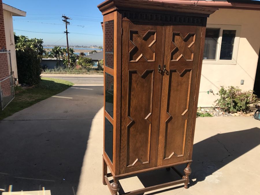 JUST ADDED - Antique Mission Style Oak Armoire With Clean Wooden Carvings And (6) Beveled Glass Side Mirrors And Bar For Hanging Clothes- See Photos [Photo 18]