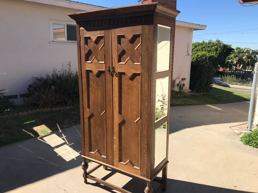 JUST ADDED - Antique Mission Style Oak Armoire With Clean Wooden Carvings And (6) Beveled Glass Side Mirrors And Bar For Hanging Clothes- See Photos [Photo 14]