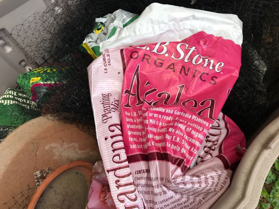 Rubbermaid Plastic Outdoor Storage Shed With Gardening Supplies (See Photos) 43'W X 26'D X 22'H [Photo 7]