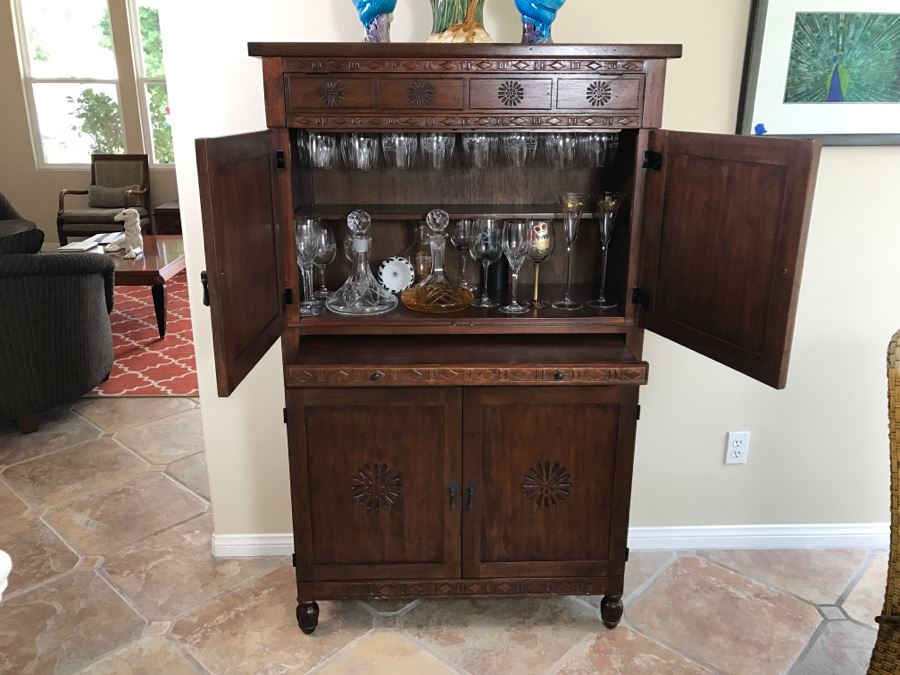 Carved Wooden Bar Cabinet With Lower Wine Storage For 45 Wine Bottles 37.5'W X 16'D X 61.5'H [Photo 1]